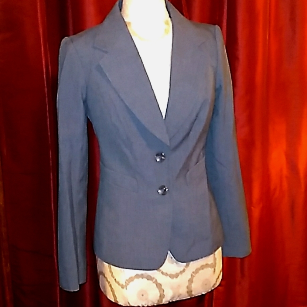 Donating in May 2022, gray suit jacket